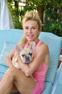 Susan McMenamin, ownder of Clean Beauty and Wellness with a dog